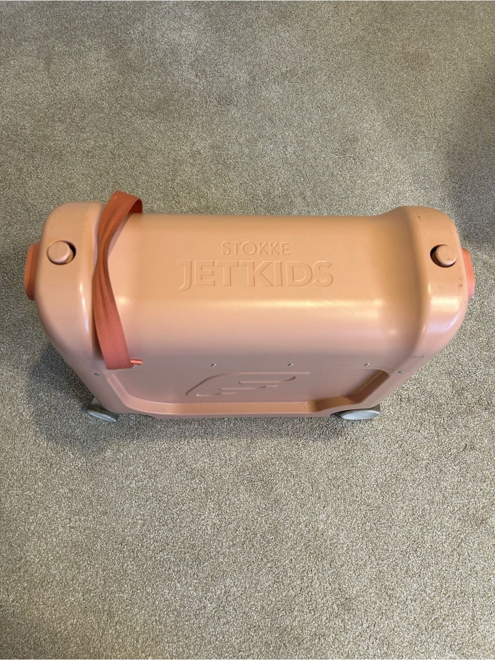 Stokke Jetkids Ride-On Carry-On in Pink